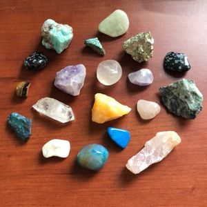 Box of crystals and gems, rough and tumbled